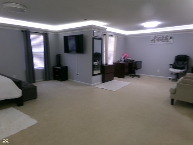 bedroom featuring light carpet, crown molding, a raised ceiling, and baseboards