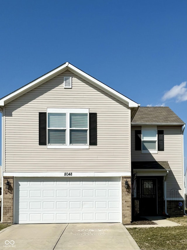 view of front of home with brick siding, concrete driveway, a garage, and roof with shingles