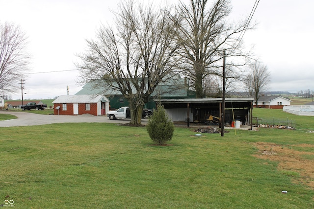 view of front of home featuring a front yard