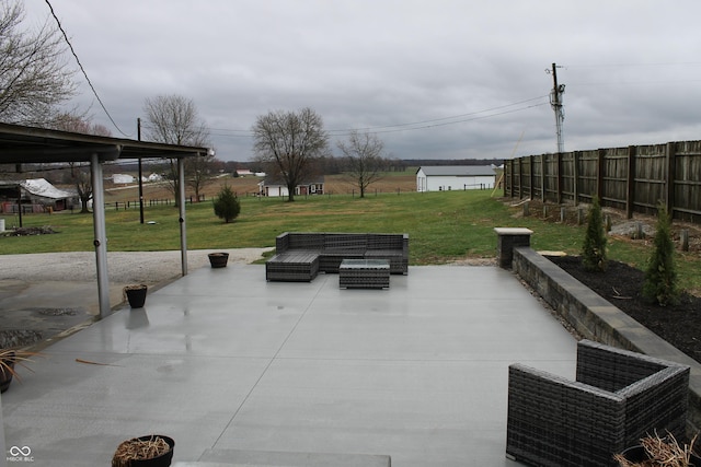 view of patio / terrace featuring fence