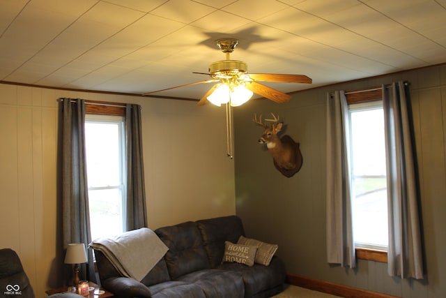 living room with a ceiling fan