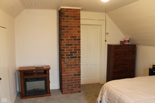 bedroom featuring wood ceiling, lofted ceiling, and carpet floors