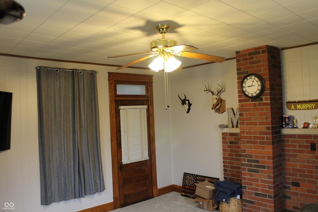 property entrance with a ceiling fan