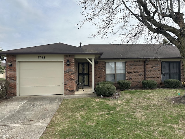 single story home with brick siding, driveway, an attached garage, and a front lawn