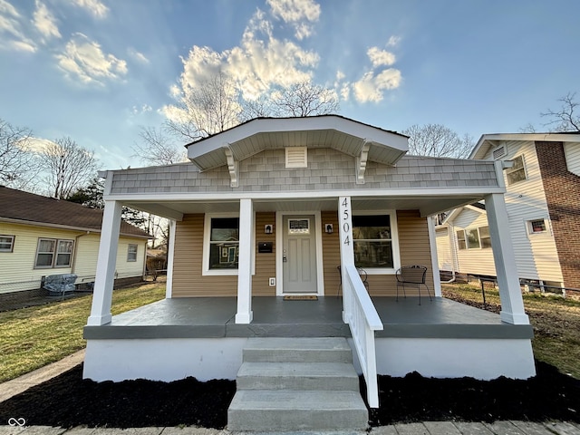 4504 Winthrop Ave, Indianapolis, IN 46205 - view of front facade featuring a porch