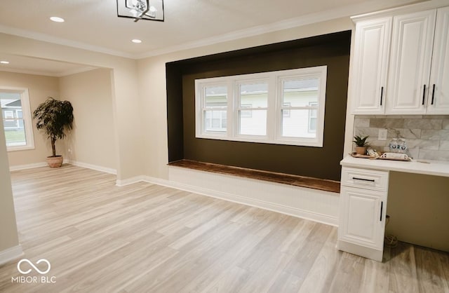 4504 Winthrop Ave, Indianapolis, IN 46205 - interior space featuring recessed lighting, crown molding, light wood finished floors, and baseboards