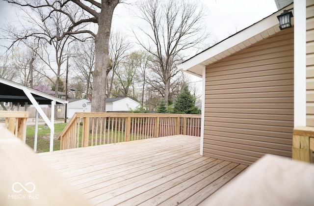 4504 Winthrop Ave, Indianapolis, IN 46205 - wooden terrace featuring fence, an outbuilding, and a storage unit