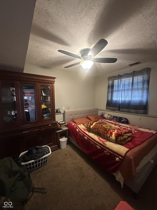 4930 Candy Spots Dr, Indianapolis, IN 46237 - bedroom featuring a textured ceiling, carpet flooring, and ceiling fan