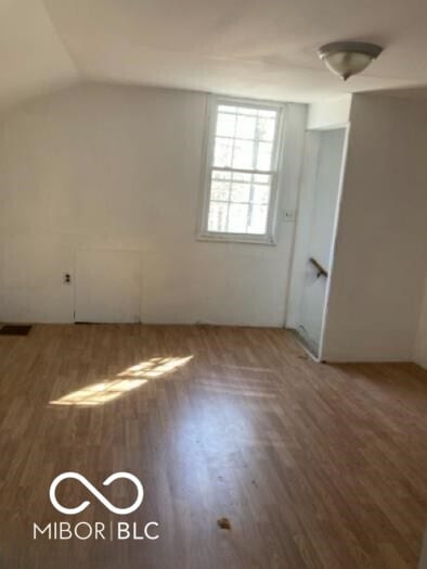635 W Pearl St, Union City, IN 47390 - interior space featuring vaulted ceiling and wood finished floors