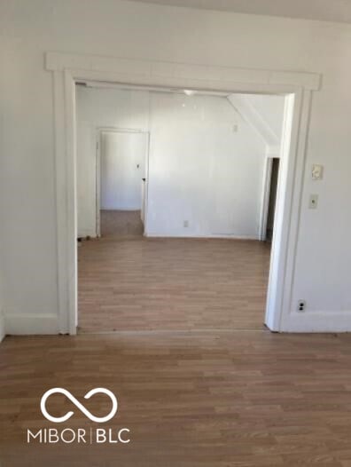 635 W Pearl St, Union City, IN 47390 - corridor featuring wood finished floors and baseboards