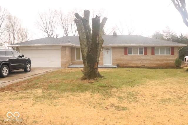 8137 S Delaware St, Indianapolis, IN 46227 - ranch-style home featuring brick siding, a front lawn, a chimney, a garage, and driveway
