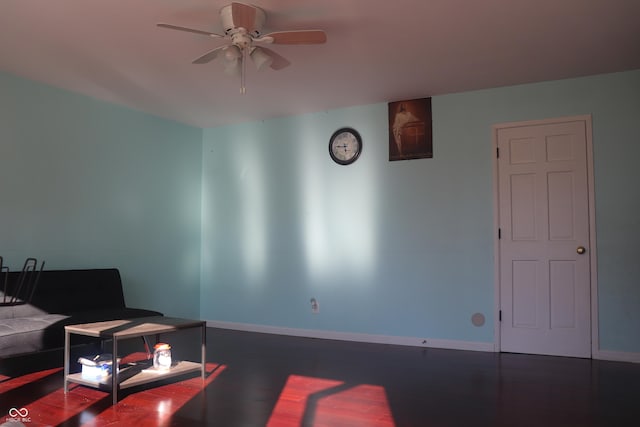 8137 S Delaware St, Indianapolis, IN 46227 - living area featuring wood finished floors, a ceiling fan, and baseboards