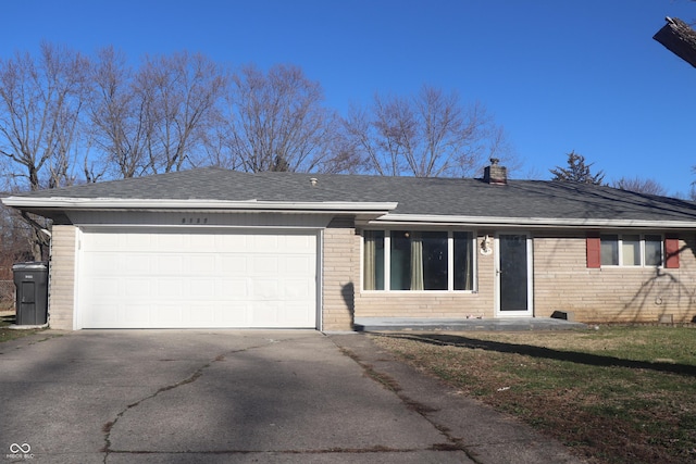 8137 S Delaware St, Indianapolis, IN 46227 - ranch-style home with driveway, roof with shingles, an attached garage, brick siding, and a chimney