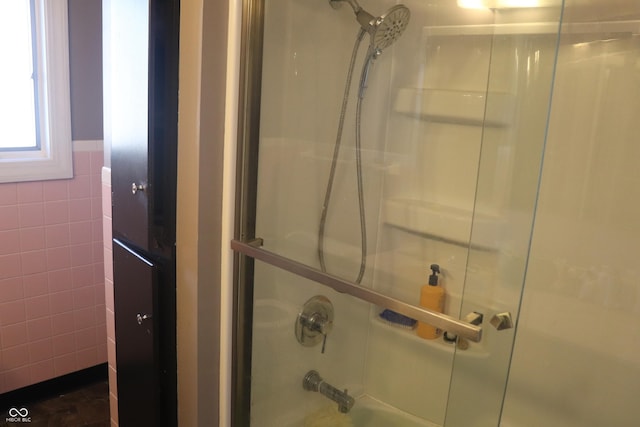 8137 S Delaware St, Indianapolis, IN 46227 - bathroom featuring tile walls and shower / bath combination
