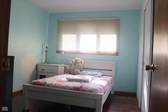 8137 S Delaware St, Indianapolis, IN 46227 - bedroom with dark wood-style flooring