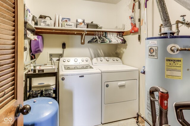 7152 Sandalwood Dr, Avon, IN 46123 - laundry room featuring independent washer and dryer, gas water heater, and laundry area