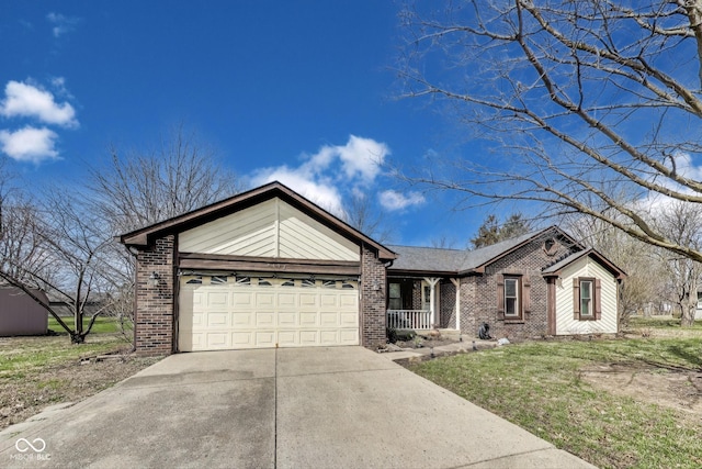 7152 Sandalwood Dr, Avon, IN 46123 - view of front facade with driveway, an attached garage, and brick siding