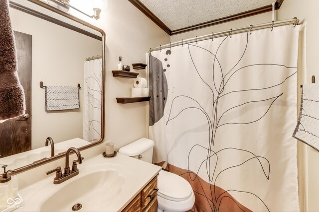 7152 Sandalwood Dr, Avon, IN 46123 - full bathroom with vanity, toilet, ornamental molding, a textured ceiling, and curtained shower