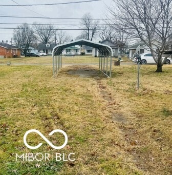 view of yard featuring a carport