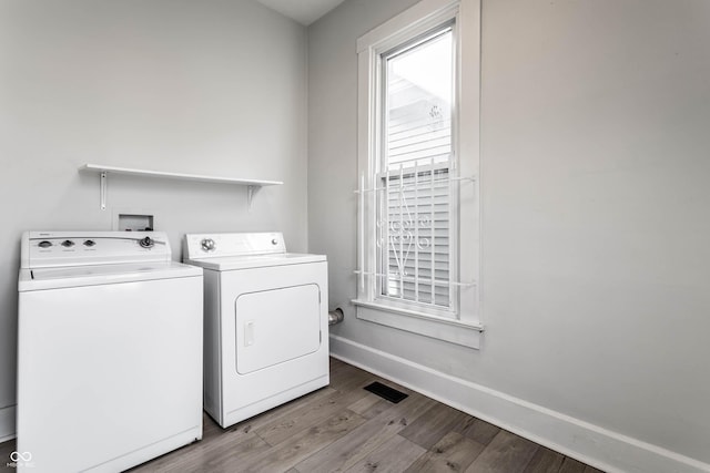 3732 N Kenwood Ave, Indianapolis, IN 46208 - laundry room featuring washing machine and dryer and wood finished floors