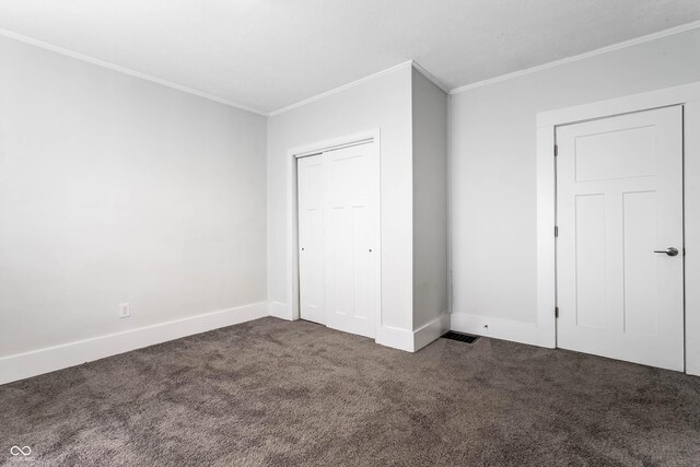 3732 N Kenwood Ave, Indianapolis, IN 46208 - unfurnished bedroom with crown molding, carpet flooring, and a closet