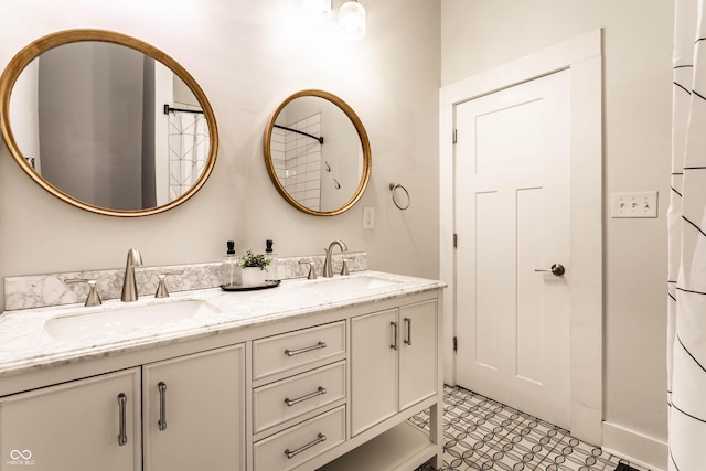 3732 N Kenwood Ave, Indianapolis, IN 46208 - bathroom featuring double vanity and tile patterned floors