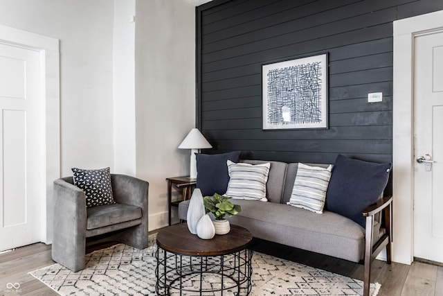 3732 N Kenwood Ave, Indianapolis, IN 46208 - living room with wood finished floors, wooden walls, and an accent wall