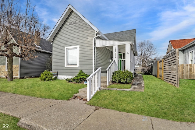 3732 N Kenwood Ave, Indianapolis, IN 46208 - shotgun-style home featuring a shingled roof