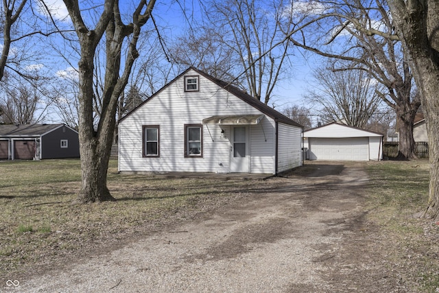 3104 Alice Ave, Indianapolis, IN 46237 - view of front of home with a garage, a front yard, and an outdoor structure