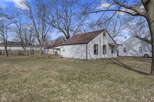 3104 Alice Ave, Indianapolis, IN 46237 - view of property exterior featuring a yard and fence