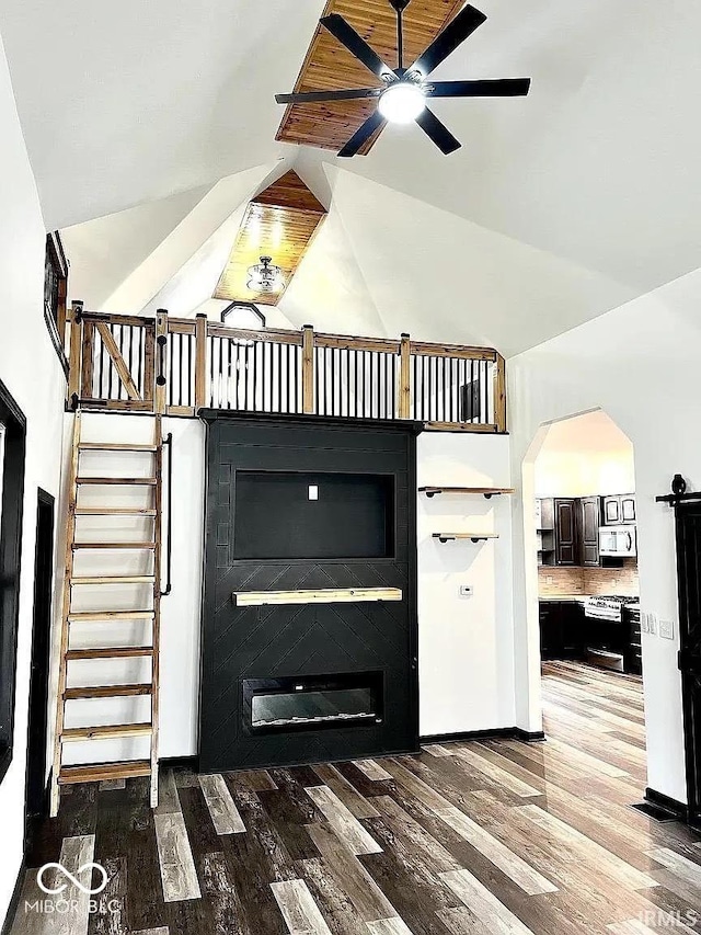 511 N Clark St, Lebanon, IN 46052 - interior space with vaulted ceiling, wood finished floors, arched walkways, and ceiling fan