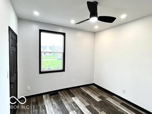 511 N Clark St, Lebanon, IN 46052 - spare room with recessed lighting, dark wood-style floors, baseboards, and ceiling fan