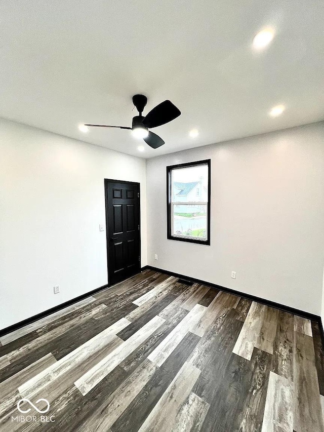 511 N Clark St, Lebanon, IN 46052 - spare room with recessed lighting, wood finished floors, baseboards, and ceiling fan