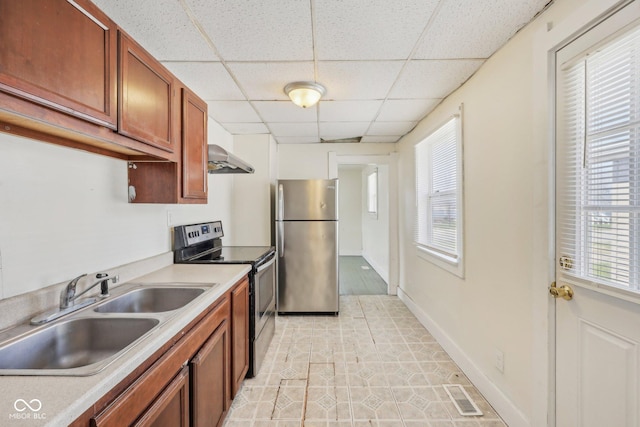 1039 S Ohio St, Martinsville, IN 46151 - kitchen with visible vents, a drop ceiling, a sink, stainless steel appliances, and light countertops