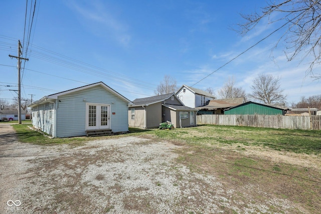 1039 S Ohio St, Martinsville, IN 46151 - back of property featuring french doors, entry steps, and fence