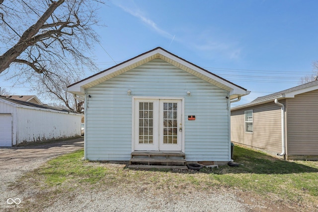 1039 S Ohio St, Martinsville, IN 46151 - exterior space featuring entry steps, an outbuilding, and a lawn
