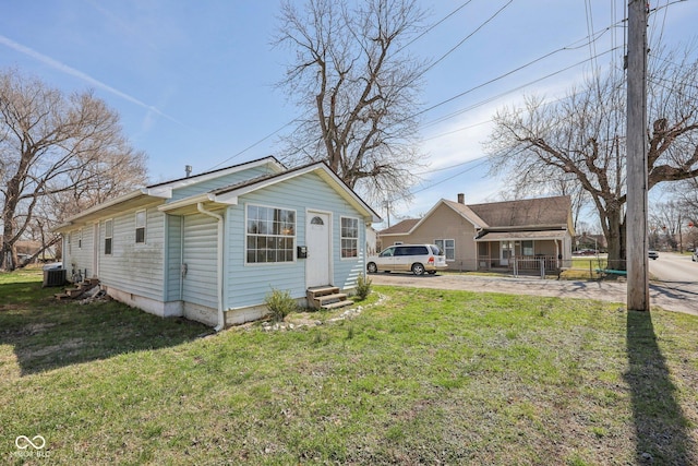 1039 S Ohio St, Martinsville, IN 46151 - rear view of house with crawl space, central air condition unit, a lawn, and entry steps