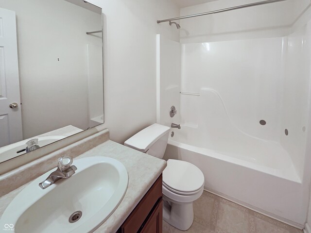 full bath featuring tub / shower combination, toilet, and vanity