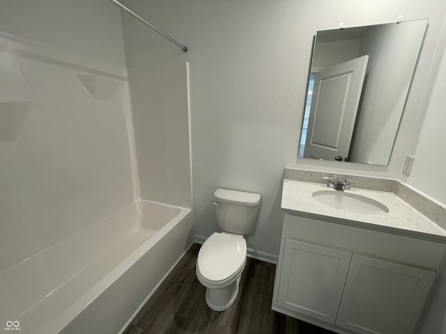 1265 Fleming Dr, Greenfield, IN 46140 - full bath with vanity, wood finished floors, and shower / bath combination