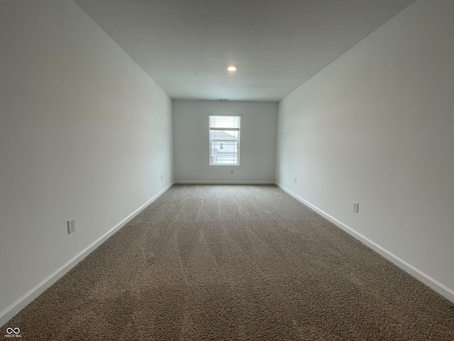 1265 Fleming Dr, Greenfield, IN 46140 - unfurnished room with light colored carpet and recessed lighting