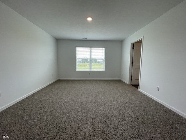 1265 Fleming Dr, Greenfield, IN 46140 - spare room featuring carpet flooring and recessed lighting