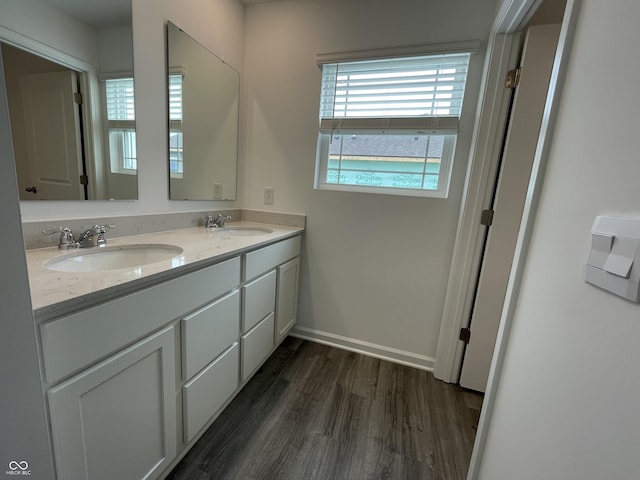 1265 Fleming Dr, Greenfield, IN 46140 - full bathroom with wood finished floors and double vanity