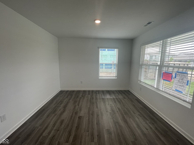 1265 Fleming Dr, Greenfield, IN 46140 - empty room with dark wood-style flooring and recessed lighting