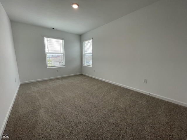 1265 Fleming Dr, Greenfield, IN 46140 - carpeted empty room featuring baseboards