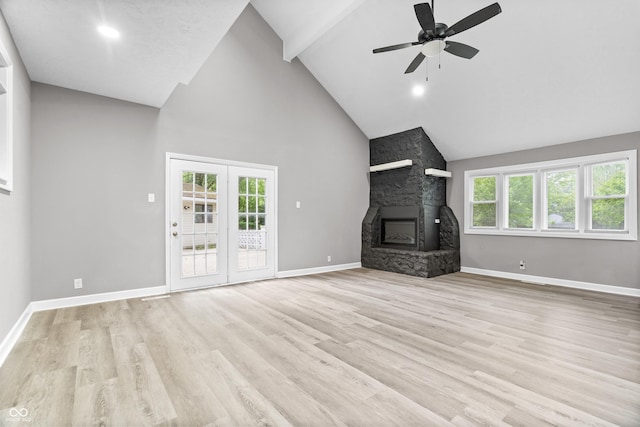 1641 Whistler Ter, Indianapolis, IN 46229 - unfurnished living room with high vaulted ceiling, a ceiling fan, beam ceiling, light wood-style flooring, and baseboards
