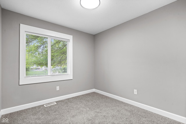 1641 Whistler Ter, Indianapolis, IN 46229 - spare room featuring carpet floors and baseboards
