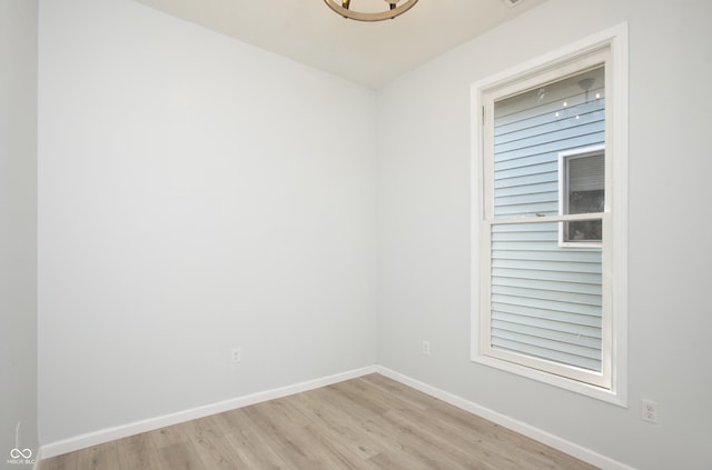 249 N Hamilton Ave, Indianapolis, IN 46201 - spare room with baseboards and light wood finished floors