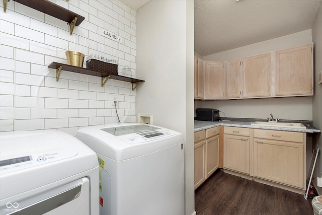 9011 Harrison Run Dr, Indianapolis, IN 46256 - washroom featuring washing machine and clothes dryer, dark wood finished floors, and cabinet space