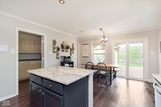 9011 Harrison Run Dr, Indianapolis, IN 46256 - kitchen with crown molding, dark wood-style flooring, a chandelier, decorative light fixtures, and a kitchen island