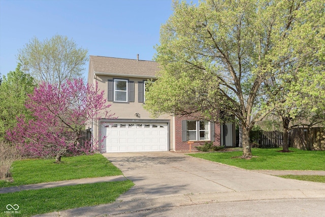 9011 Harrison Run Dr, Indianapolis, IN 46256 - traditional-style house featuring driveway, a garage, and brick siding